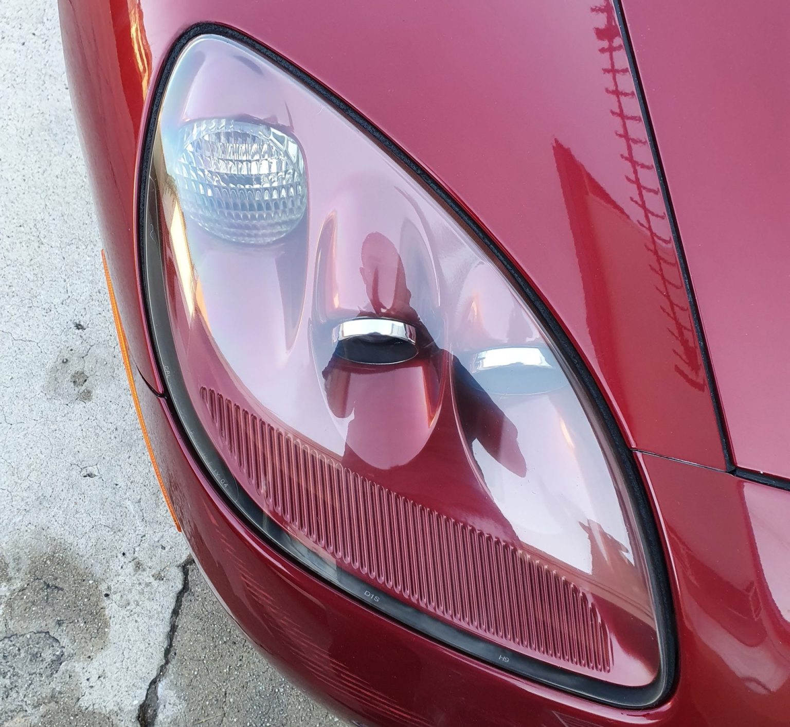 A Fresh Pair of Headlights to a Red Color Car