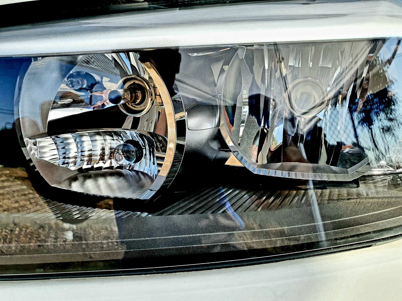 The Front Headlights of a Car Close Up