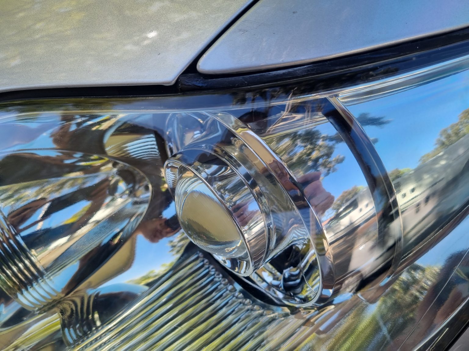 Headlights Close Up of a Grey Car