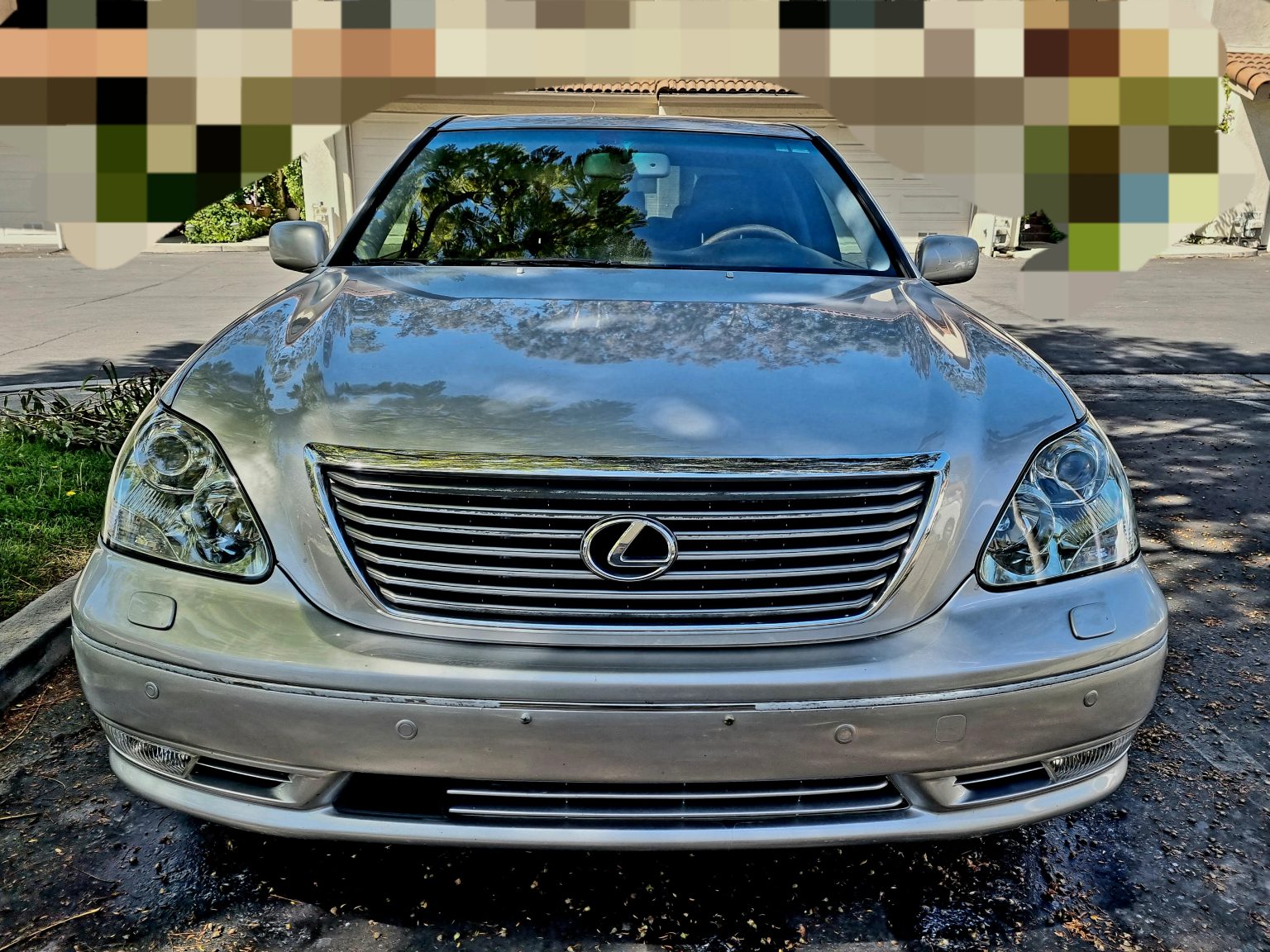 A Grey Color Lexus Car Front View